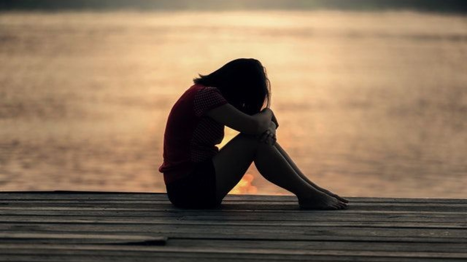 woman-sad-near-water.jpg